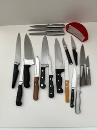 Lot Of Knives And A Cheese Grater