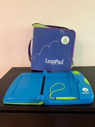 2-Leap Frog Consoles, Books, Cartridges, And Case