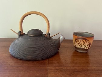 Cast Iron Tea Pot And Handmade Pottery Tea Cup