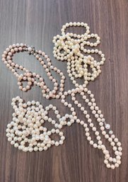 4 Strands Of Faux Pearls