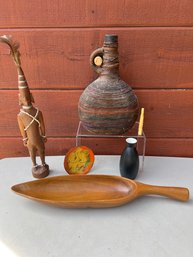 Wood Statue Made In Kenya, Wrapped Mid Century Decanter, Metal And Enamel Coaster, Black Vase, And Monkeypod