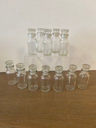 12 Apothecary / Spice Glass Bottles  Marked LC On Bottom