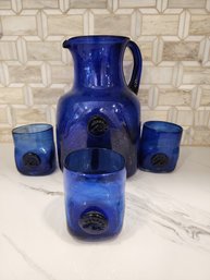 BLOWN GLASS COBALT BLUE PITCHER AND 3 GLASSES.  BEAUTIFUL