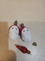 #9  2 VINAGE CHRISTMAS ORNAMENTS  SANTA FACES AND LIGHT BULB