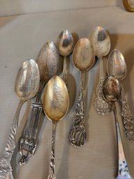 8 Sterling Silver Collector Spoons