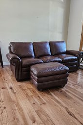 Stunning All Leather Sofa And Ottoman With Classic Lines, Includes Ottoman