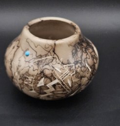 Signed Native American Horsehair Pottery With Etched Imagery And Turquoise Accent Stone.