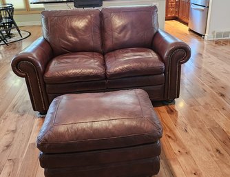 Luxurious All Leather Loveseat With Classic Lines And Matching Ottoman