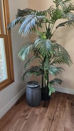 Faux Palm Tree Paired With Round Plastic Container