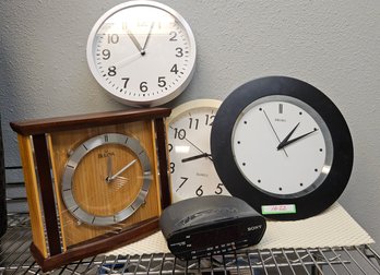 Collection Of Five Clocks Including High End Designer Clock From Bulova And Beautiful Seiko