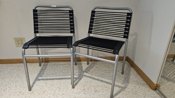 Set Of Two Black Bungee Side Chairs With Chrome Frame In New Condition