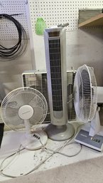 Collection Of Four Fans Featuring A Vertical Oscillating Fan With Remote By Aloha Breeze.