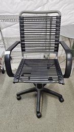 Rolling Adjustable Flex Strap Office Chair In Good Condition.