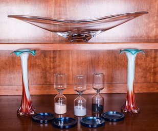 A Collection Of Glass Decorative Items