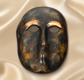 Two Venetian Gianni Cavalier Leather Masks