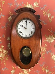 Unusual Oval Oak Wall Clock