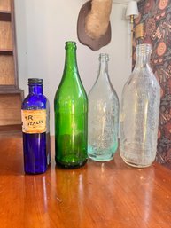 VINTAGE BOTTLE LOT (4) CANADA DRY AND APOTHECARY AND I V BOTTLE AND BOYNTON