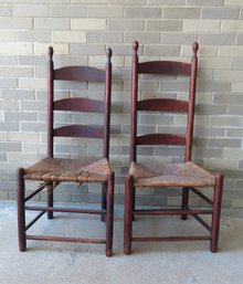 A Pair Of Shaker Ladder Back Chairs With Tilters In Original Red Paint And Original Rush Seats, Early 19th Cen