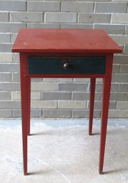 A Custom Made Primitive Hepplewhite Style 1 Drawer Stand In Red Paint And Tapered Legs, The Drawer In Dark Blu