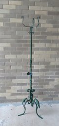 A Tall Wrought Iron Plant Stand In Newer Green Paint, With Applied Floral Leaf Decorations, Tri-legs With Appl