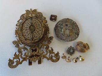 A Grouping Of Vintage Jewelry And Decorative Objects Including: An Ornate Austrian Metal Picture Frame With Ov