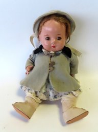Small Boy Doll With Sleepy Eyes, Composition Body And Limbs, Sleepy Eyes, Bent Limbs, And Appears To Retain Or