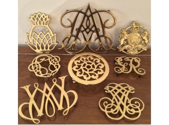 Eight Piece Brass Trivet Lot Colonial Williamsburg, Baldwin, Etc.