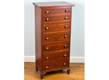 DIMINUTIVE GRADUATING MAHOGANY (7) DRAWER CHEST