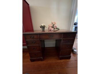 Vintage Desk With Drawers And Decorative Flowers