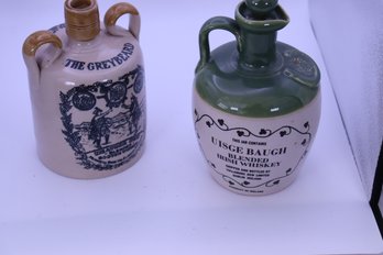 131. 2 Whiskey Advertising Jugs