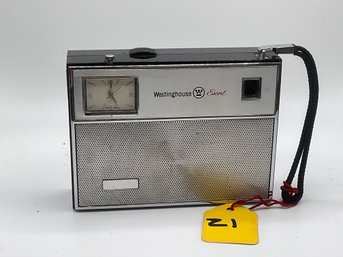 21- Westing House Escort Clock Radio