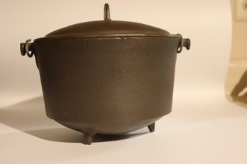 42 - Cast Iron Footed Pot