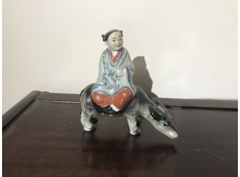 Asian Figure On Cow 50