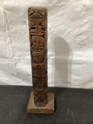 Totem Pole With Thunderbird, Bear Holding Mans Head And Medicine Man Wood