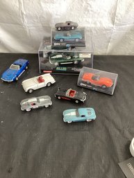 Maisto 53 Corvette 1/38, 2 Hot Wheels 63 Vette, Road Signature '57, 67 &69 Newsday, Carrera Evolution '67