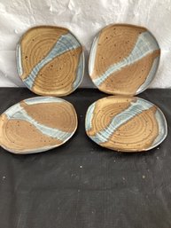 4 Pottery Plates Signed Illegibly