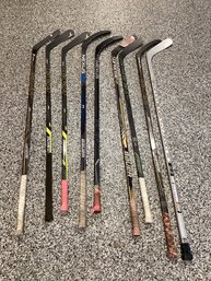 9 Assorted Hockey Sticks