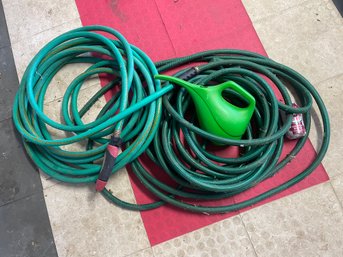 2 Garden Hoses & Plastic Watering Can