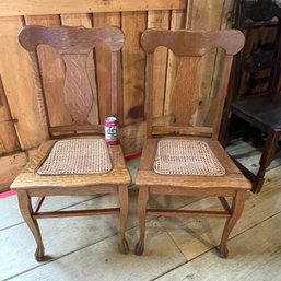 Pair Of Antique Oak Chairs With Caned Seats