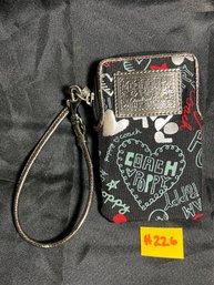 COACH Poppy Signature Cellphone Wallet Wristlet