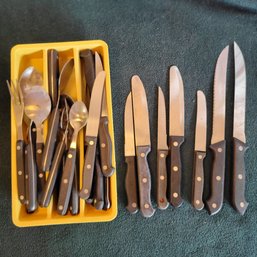 Black Handled Silverware And Knives Mixture Of Brands