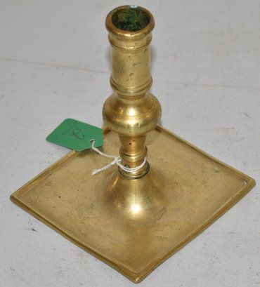 EARLY TURNED BRASS CANDLESTICK