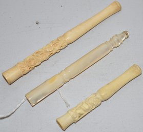 (2) CARVED ANTIQUE SMOKING STEMS