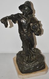 SPELTER FIGURE OF YOUNG FISHING BOY