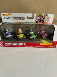 HOT WHEELS MARIO KART VEHICLE 4-PACK WITH 1 EXCLUSIVE COLLECTIBLE MODEL