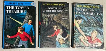 Set Of 3 Hardy Boys Books - The Tower Treasure, Footprints Under The Window, And The Hidden Harbor Mystery