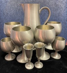 Pewter Pitcher With Eight Pewter Goblets In Three Sizes