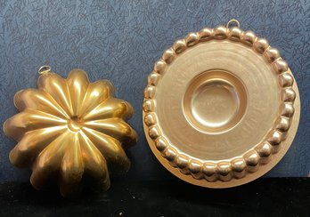 Two Copper Colored Decorative Bundt Pans