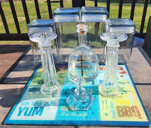 Glassware Lot - Glass Storage Canisters, Candlestick Holders, Cutting Board & Bottle