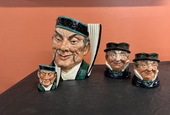 Four (4) Royal Doulton Jugs - (2) Mikado - (2) Capt. Cuttle